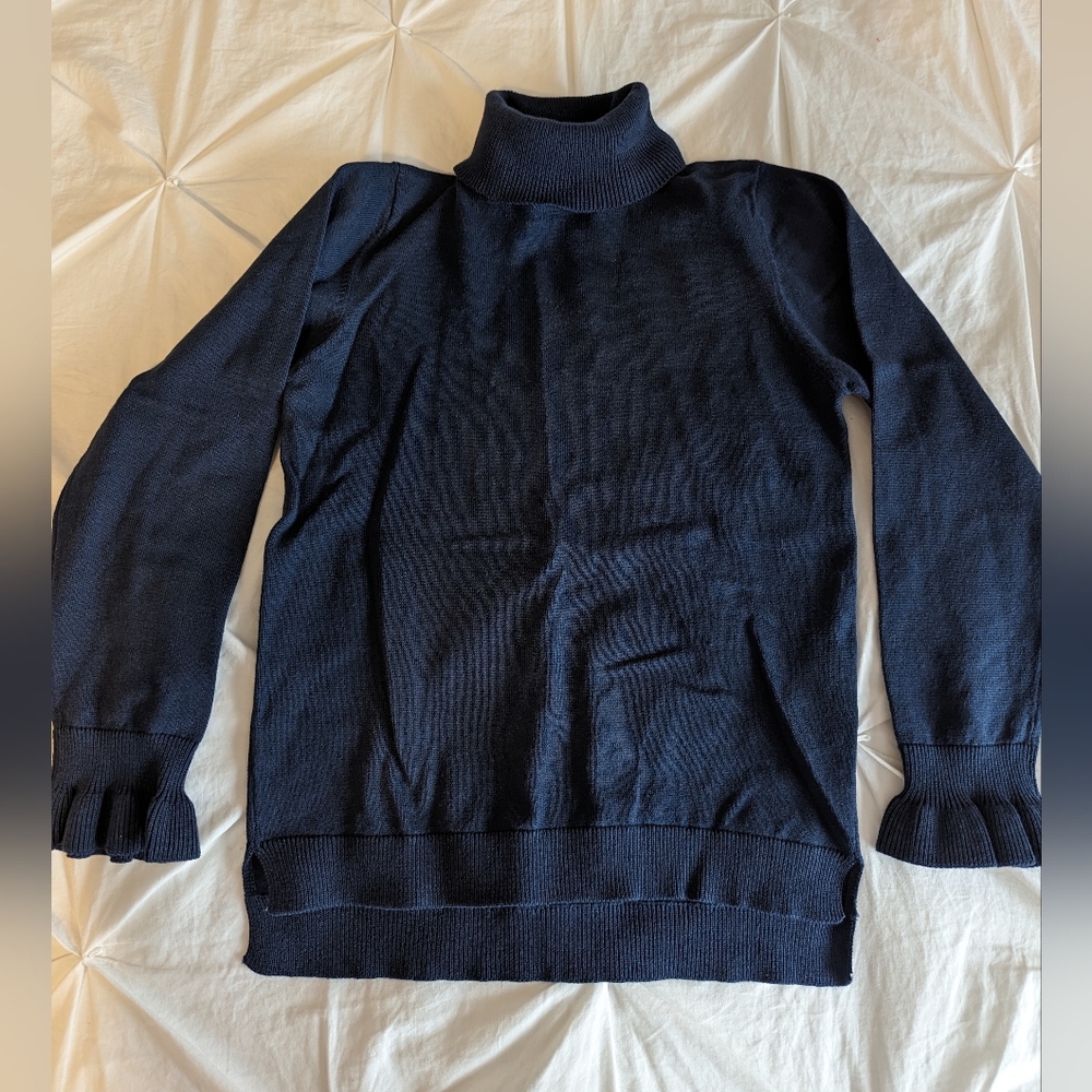 Kids sweater size 8/9 years old.